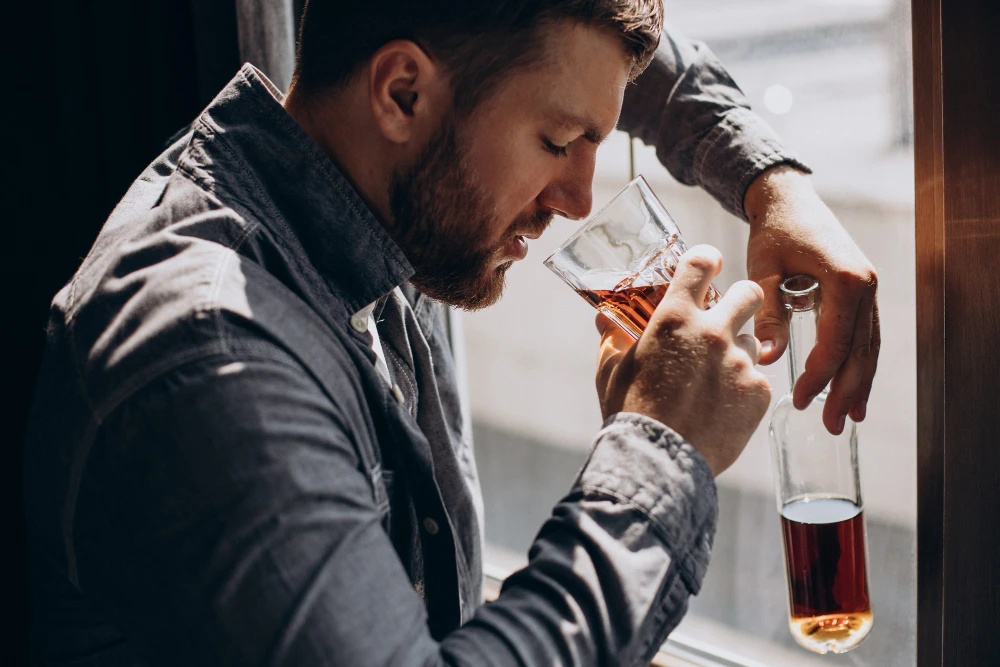 Alkoholik w trakcie ciągu alkoholowego